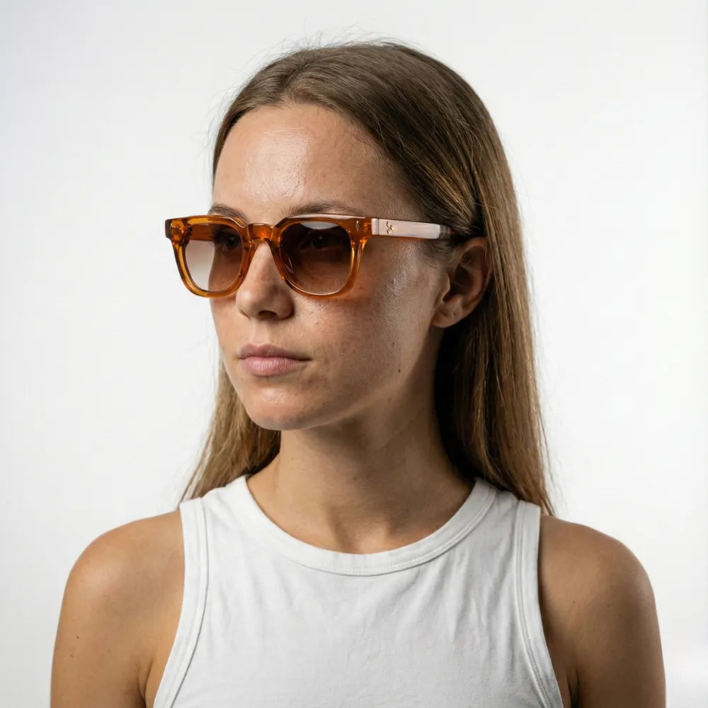 Two-tone wayfarer sunglasses, model portrait — HARO Taormina 1955